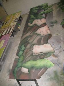 Painting flats on Puss in Boots: Rocks and trees. Designer Will Hargreaves, flats made by Set up Scenery