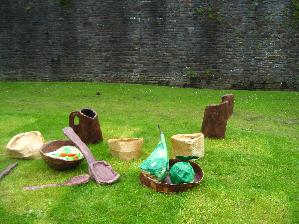 Workshop Leader making a Giants Picnnic with Primary Schools in Caerphilly, Inspired by food from Medieval and Stuart times