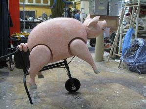 Pig puppet: with mechanical legs and jaw. Carved from polystyrene sealed with epoxy resin. Made with Andy John, for Welsh National Opera's singing club