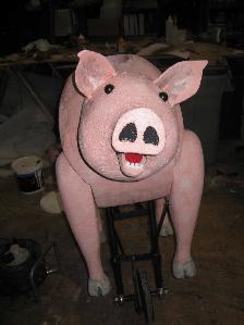 Pig puppet: with mechanical legs and jaw. Carved from polystyrene sealed with epoxy resin. Made with Andy John, for Welsh National Opera's singing club