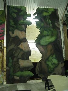 Painting flats on Puss in Boots: Rocks and trees. Designer Will Hargreaves, flats made by Set up